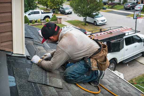 Professional Roofing technician working in Newtonville, NY